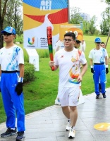 九牧林晓伟担任世界大运会火炬手