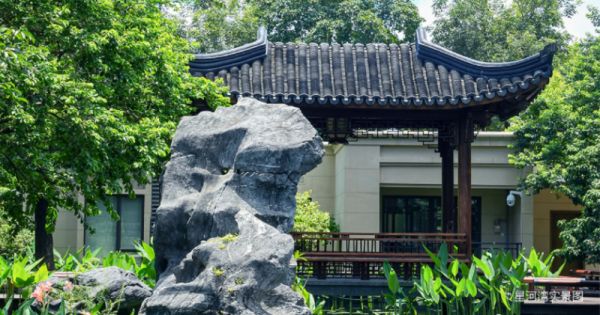 People enjoying the scenery in a pavilion