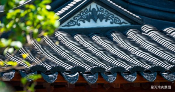 Traditional Chinese pavilion with wood structure and carvings