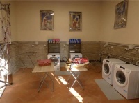 海尔欧洲在意大利开设公益洗衣房