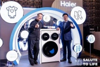 海尔三筒洗衣机泰国首销，001号用户现场体验