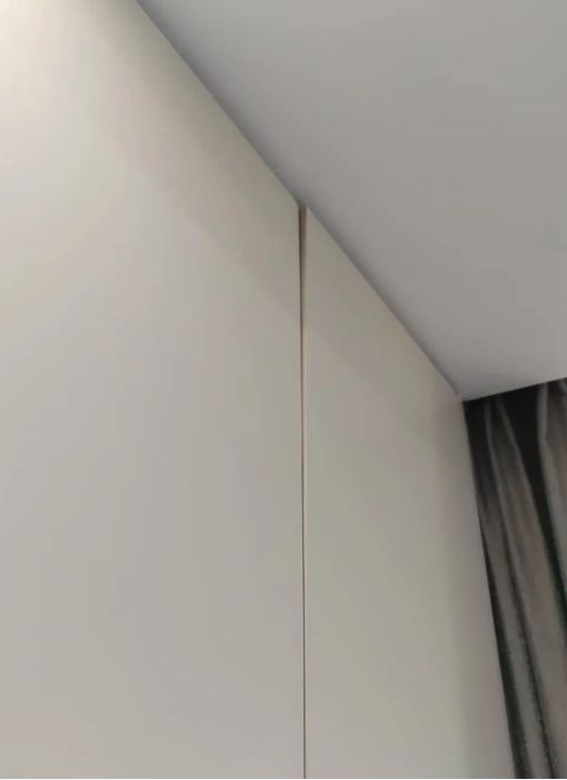 Composite panel one-piece top cabinet door warping